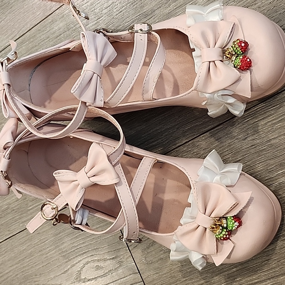 Pink lolita shoes with bows and strawberries